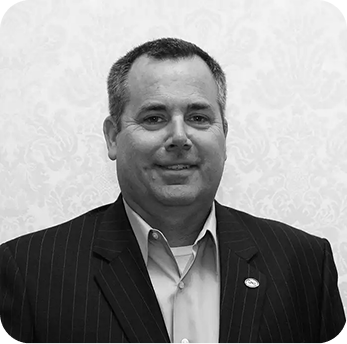 ADN team member headshot, black and white professional portrait